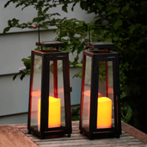 Candle in enclosure on patio