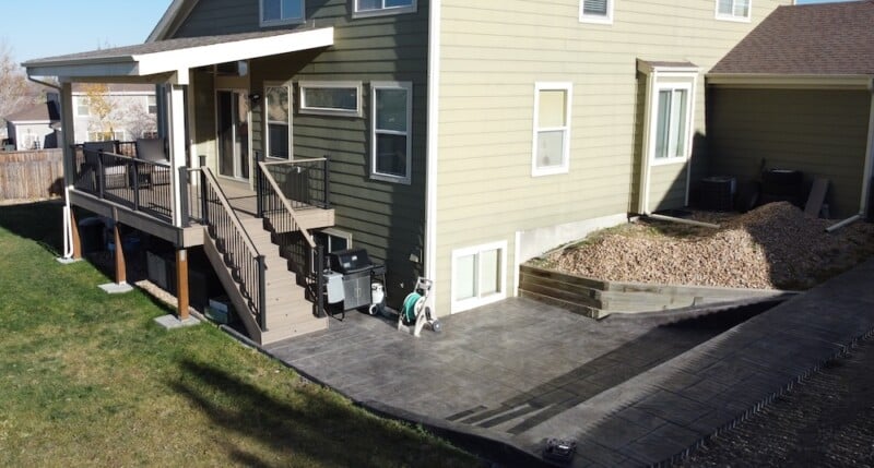 Concrete Patio vs. Composite Deck Concrete Patio vs. Composite Deck